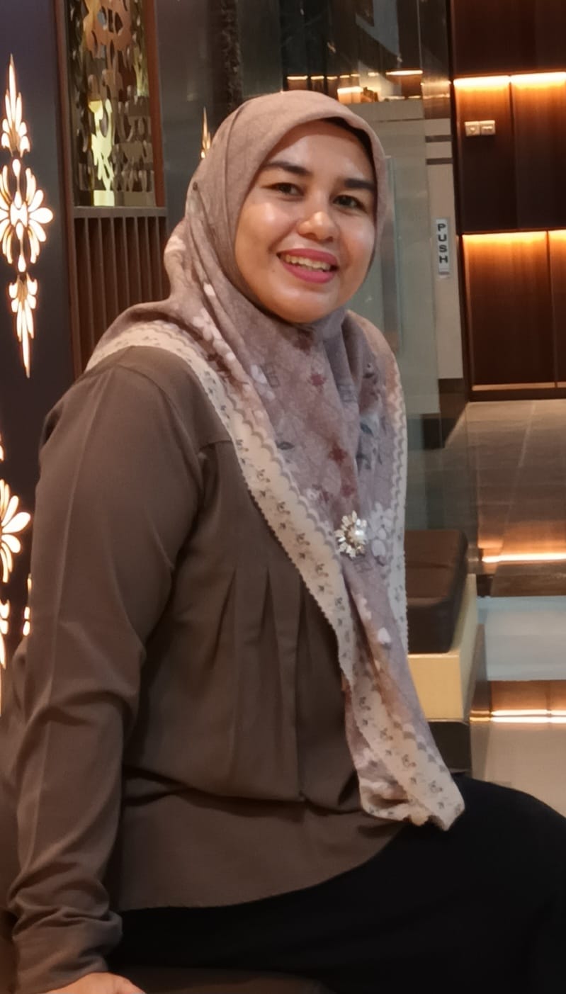 Nelvi Salendra, S.Pd., M.Pd.T.